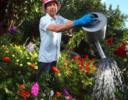Crew member preparing green waste at Vauxhall garden site